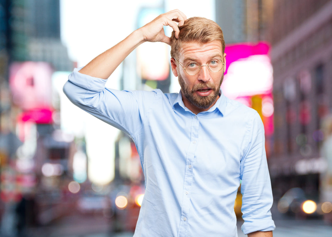 Chute de cheveux homme : causes, signes et solutions pour la stopper