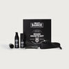 Le Coffret Viking de MaxBarber, contenant le kit de croissance de barbe, posé au sol sur un fond blanc."